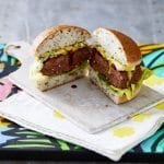GRILLED BLACK ANGUS BEEF BURGER WITH BLUE CHEESE, HOT SMOKY BBQ SAUCE AND HONEY MUSTARD DRESSING